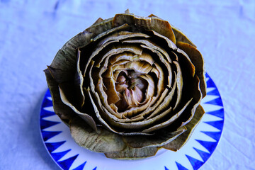 Steamed whole globe artichoke