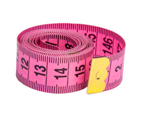 Pink rubber tape measure for sewing cloth or fabric isolated on the white