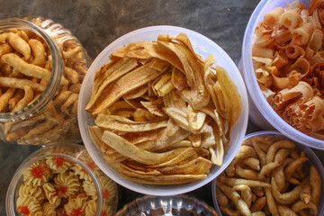 kripik pisang, telur gabus, kue semprit, is traditional food from indonesia, to celebrate ied mubarak or ied fitr