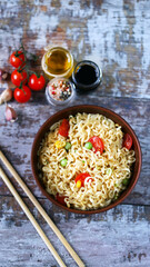 Chinese style noodle bowl. Spicy noodle soup.