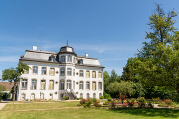 Fototapeta na wymiar Übach-Palenberg, Germany - May 31, 2020: Zweibrüggen Castle and garden