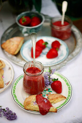 Lilac scones with strawberry curd in the summer garden