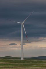 Fototapeta premium windmill against a cloudy sky