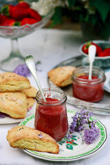 Lilac scones with strawberry curd in the summer garden