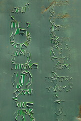 Peeling green paint