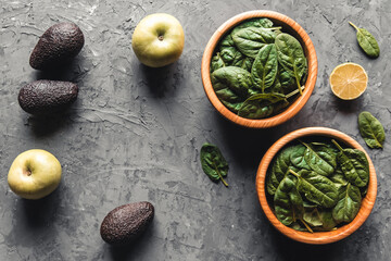 Green food background on stone table top view. Healthy food, vegan, eco products.