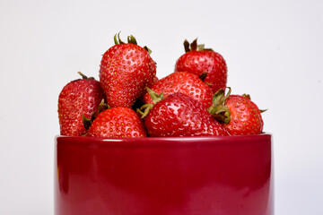 delicious strawberries ready to eat on white background