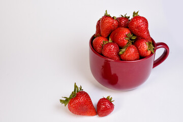delicious strawberries ready to eat on white background