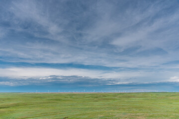 Fototapeta na wymiar Wind turbines located in South Eastern Alberta close to Carmangay. Project is called the Blackspring Ridge Wind Farm.