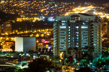 Fototapeta na wymiar Medellin, Antioquia / Colombia. August 08, 2019. Night view of the EPM Smart Building