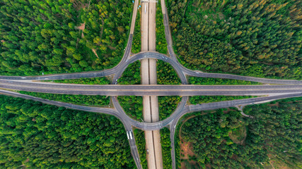 wide angle aerial view of motorway junction day and night