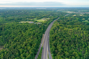 Motorway sceen goes through countryy side green