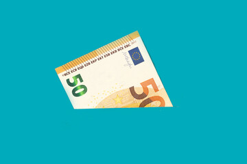 Banknote fifty euros in the pocket. Money close up. Abstraction