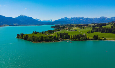 Aerial view over Lake Forggensee at the city of Fuessen in Bavaria Germany