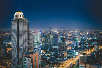 Fototapeta na wymiar Bangkok City Aerial View and Skyscraper Cityscape of Thailand, Night Scenery View Business Downtown and Fianancial District of Thailand. Landscape Urban Skyscrapers Building of Bangkok Capital City