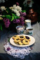 lavender shortbread on a table in a spring garden..style vintage