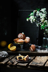 lemon blueberry muffins.dark photo..style rustic