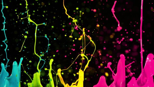 Colorful splashing paint in super slow motion. Shooted with high speed cinema camera at 1000fps