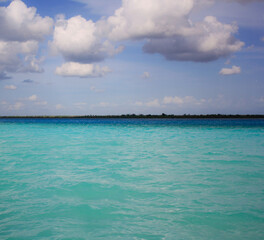 The Bacalar lake is renowned for its striking blue color shades and water clarity