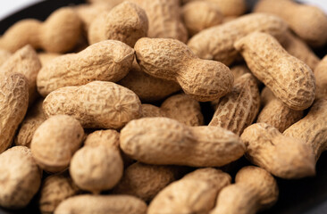 peanut in a shell texture on white background.