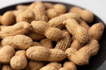 peanut in a shell texture on white background.