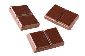 Three dark chocolate pieces set on a white background .Clipping path