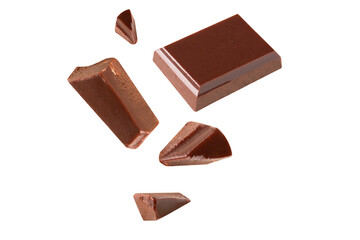 Three dark chocolate pieces Blast pieces in the air on a white background .Clipping path