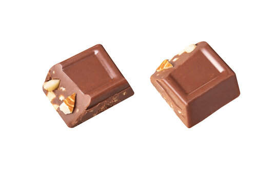 almond Chocolate bar pieces fly  on white background isolated from side view  .Image stack Full depth of field macro
