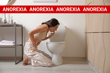 Vomiting young woman near toilet bowl at home. Concept of anorexia