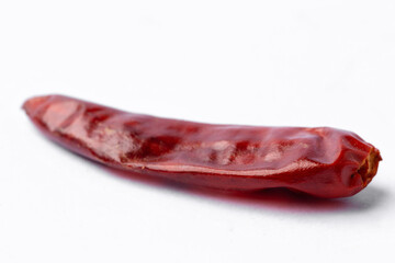 dried chili peppers on white background