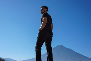 man on the top of the mountain