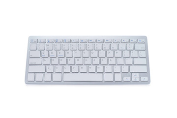 Top view of Modern computer keyboard isolated on white background with clipping path. material made from aluminum and plastic. It is electronic device used for business and internet communication.