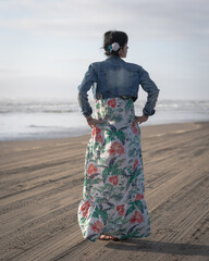 Beautiful Woman In Dress Enjoying The Coast