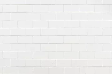 Fototapeten Konkrete Backdrop of white painted concrete block in running bond pattern, creative copy space, horizontal aspect  © Natalie Schorr