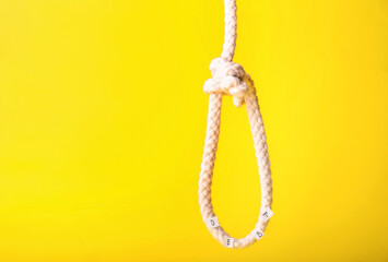 Noose on color background. Concept of debt