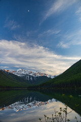 Great Northern Mountain reflection on Lake Stanton at sunset