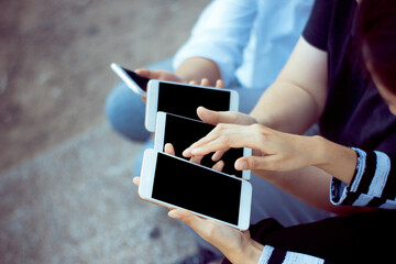 group of people using smartphone for online shopping,learning,working concept.