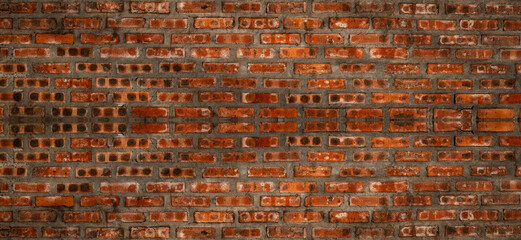 Naklejka premium Orange brick wall texture background