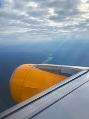 Airplane jet engine abstract. Flying forty thousand feet above sea level.