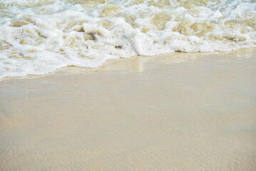 wave on sand, ocean wave on sandy beach in summer with copy space for text, Background.