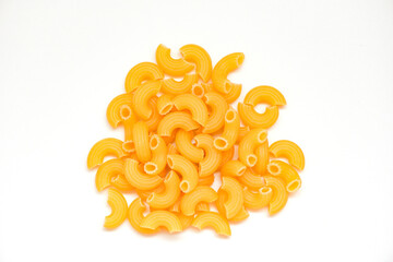 macaroni top view on white background - close up raw macaroni uncooked delicious pasta or penne noodles