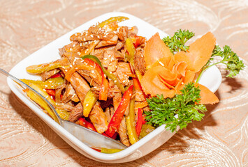 A warm fresh  meat salad for a party