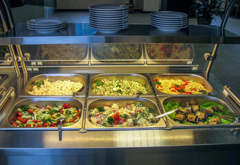 Trays with food in a Russian cuisine canteen