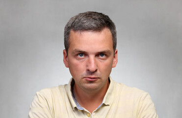 Closeup portrait of an evil man.
