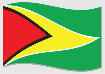Waving flag of Guyana vector graphic. Waving Guyanese flag illustration. Guyana country flag wavin in the wind is a symbol of freedom and independence.