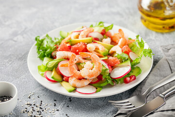 Salad with prawns, grapefruit,  cucumber