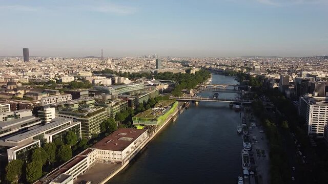Austerlitz dock and Paris city with Eiffel tower in background. Aerial