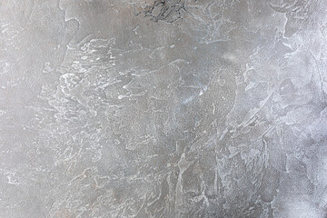 Abstract textured grey surface. Beautiful rich background in color and shades of concrete or cement.
