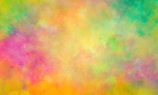 Colorful watercolor background of abstract sunset or Easter sunrise sky with puffy color splash clouds in bright painted colors of pink yellow orange and green
