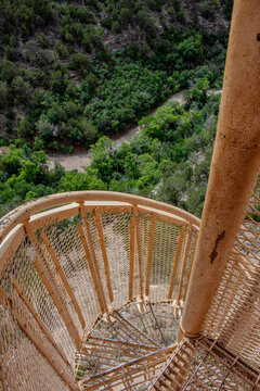 View looking down the spiral staircase on the Sandia Man Cave trail in the Sandia Mountains outside of Placitas, New Mexico